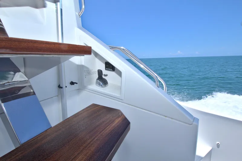 Slide: The Image of Staircase on 2018 Cruisers Yachts 54 Fly with ocean view. - 20