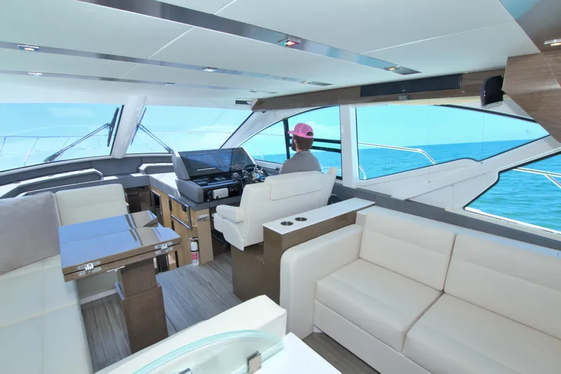 Slide: The Image of Luxurious interior of 2018 Cruisers Yachts 54 Fly with ocean view. - 41