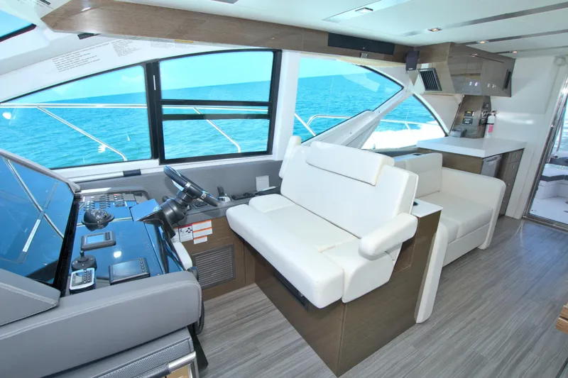 Slide: The Image of Luxurious interior of 2018 Cruisers Yachts 54 Fly with ocean view. - 43