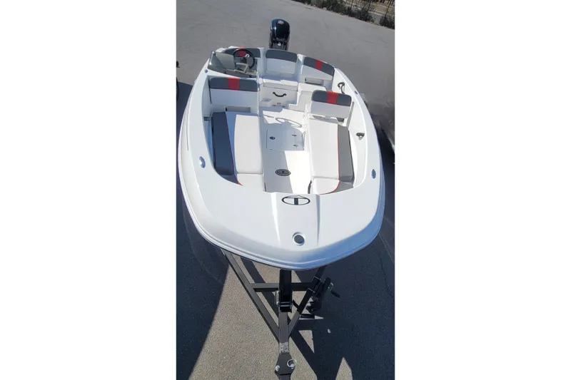 Slide: The Image of 2025 Tahoe T18 boat with sleek white design and spacious seating. - 3