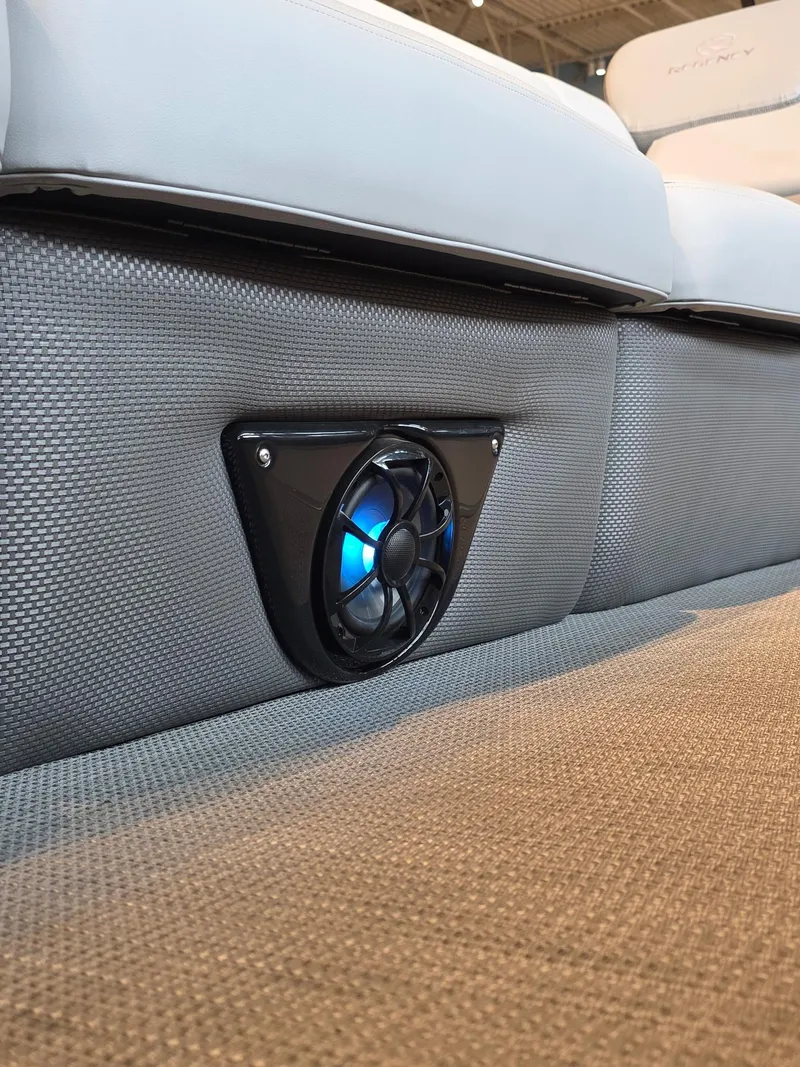 Slide: The Image of Speaker with blue light on 2025 Regency 250 LE3 boat interior. - 8