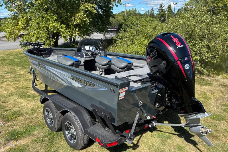 Slide: The Image of 2025 Ranger VS1882SC Reata boat with powerful outboard motor on a trailer. - 2