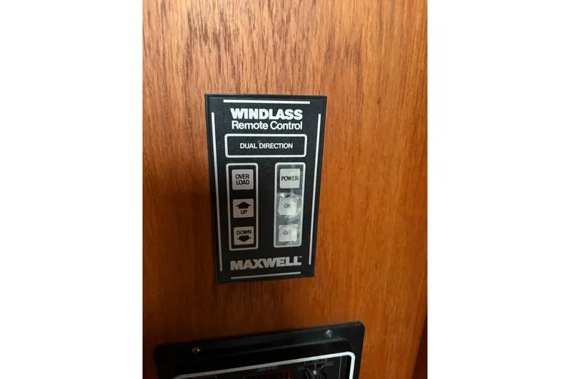 Slide: The Image of Windlass remote control panel on 1988 Cooper Prowler boat, featuring Maxwell controls. - 47