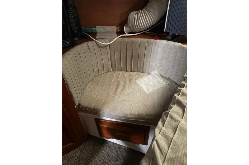 Slide: The Image of 1988 Cooper Prowler interior with cushioned seating and wooden accents. - 70