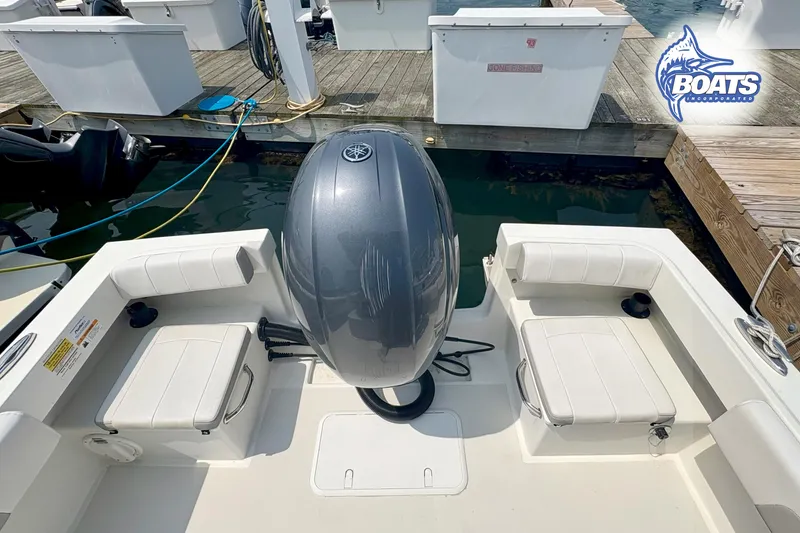 Slide: The Image of 2021 Parker 2300 Center Console boat with Yamaha outboard engine at dock. - 14