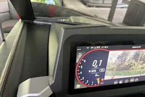 Slide: The Image of 2022 Malibu Wakesetter 23 LSV dashboard with digital display and controls. - 27