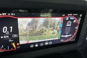 Slide: The Image of Dashboard display of 2022 Malibu Wakesetter 23 LSV showing speed, battery, and rearview camera. - 28