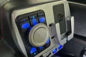 Slide: The Image of Control panel of 2022 Malibu Wakesetter 23 LSV with illuminated buttons. - 34