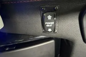 Slide: The Image of Power seat control in 2022 Malibu Wakesetter 23 LSV boat interior. - 36