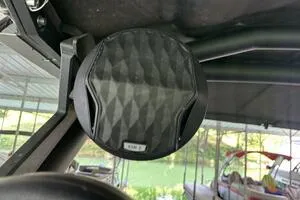 Slide: The Image of 2022 Malibu Wakesetter 23 LSV boat speaker under canopy. - 46