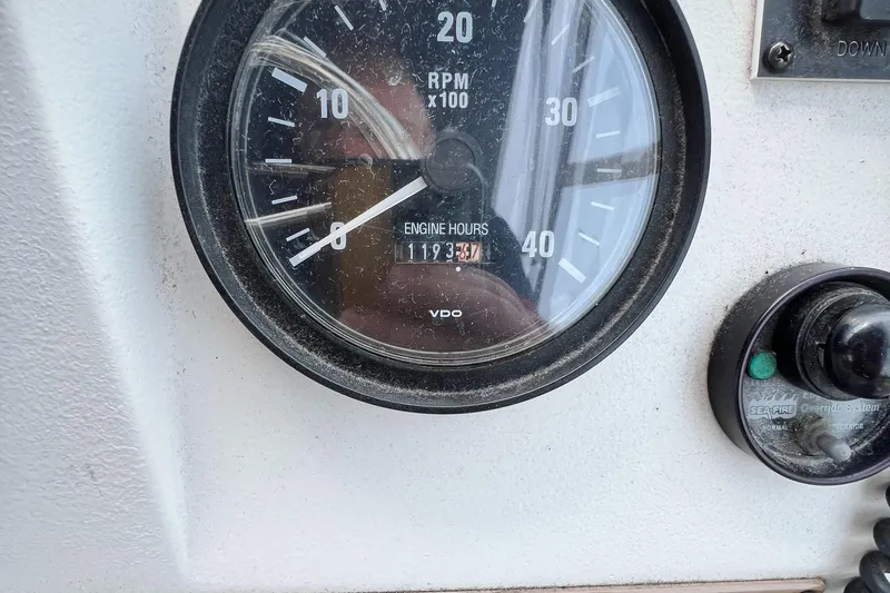Slide: The Image of Close-up of a 2001 Mainship 34 PILOT engine hour meter showing 1193.7 hours. - 18