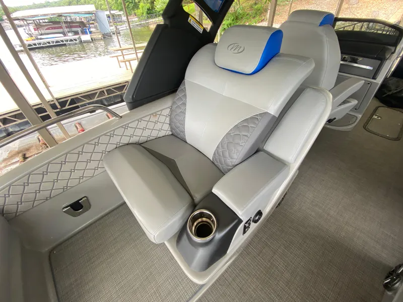 Slide: The Image of Luxurious seating in 2022 Manitou 25 LX SRW SHP pontoon boat interior. - 20
