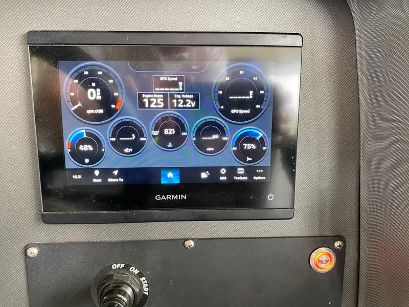 Slide: The Image of Garmin display on 2022 Manitou 25 LX SRW SHP showing engine metrics and GPS speed. - 23