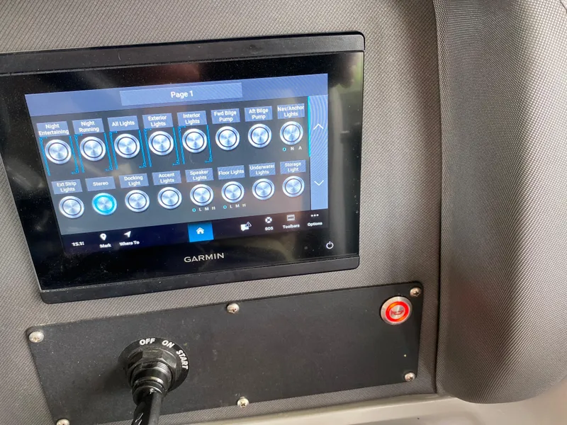 Slide: The Image of Garmin control panel on 2022 Manitou 25 LX SRW SHP boat dashboard. - 30