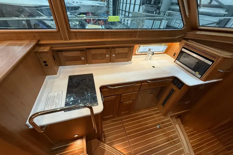 Slide: The Image of Luxurious kitchen interior of 2026 Sabre 45 Salon Express yacht with modern appliances. - 19