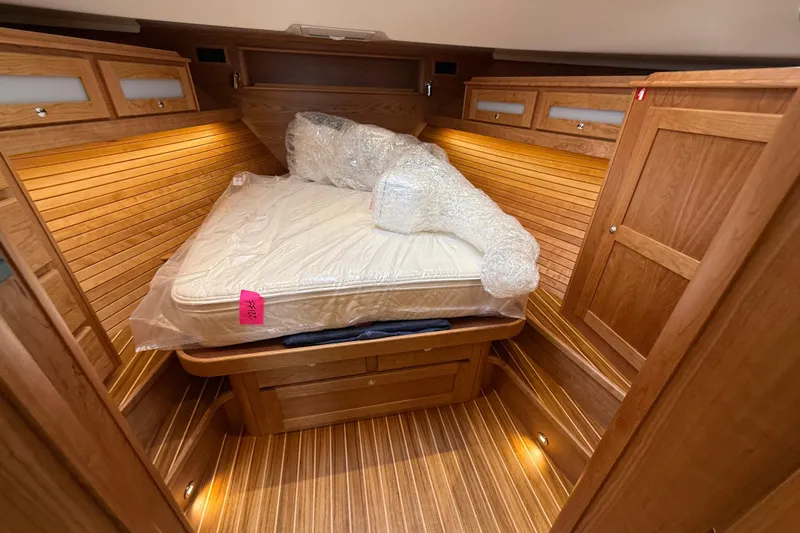 Slide: The Image of Luxurious wooden cabin interior of 2026 Sabre 45 Salon Express yacht. - 22
