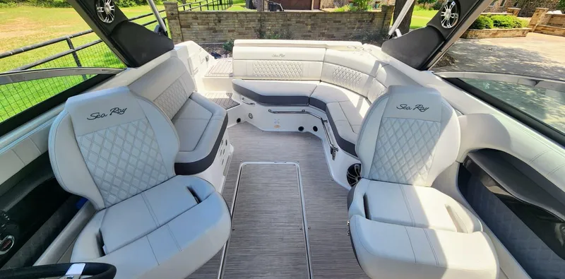 Slide: The Image of Luxurious interior of 2021 Sea Ray SLX 250 boat with plush seating and elegant design. - 20