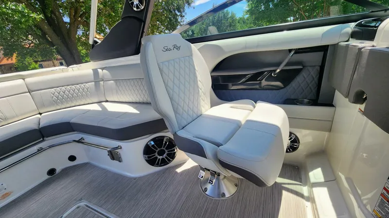 Slide: The Image of 2021 Sea Ray SLX 250 boat interior with luxurious seating and modern design. - 27