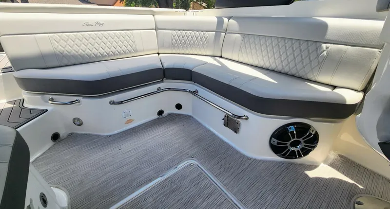 Slide: The Image of 2021 Sea Ray SLX 250 boat interior with luxurious seating and modern design. - 28