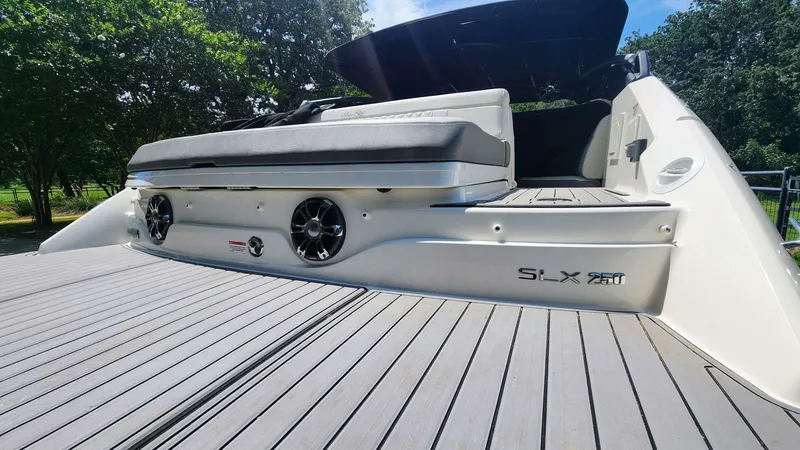 Slide: The Image of 2021 Sea Ray SLX 250 boat with sleek deck and modern design. - 32