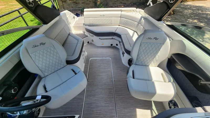 Slide: The Image of 2021 Sea Ray SLX 250 boat interior with luxurious seating and modern design. - 6