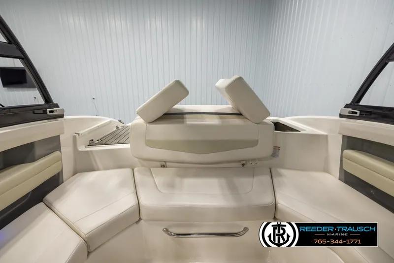 Slide: The Image of 2016 Chaparral 216 SSi boat interior with adjustable seating and sleek design. - 19
