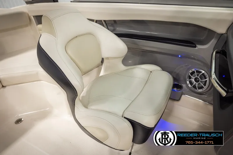 Slide: The Image of 2016 Chaparral 216 SSi boat interior with luxury seating and speaker system. - 23