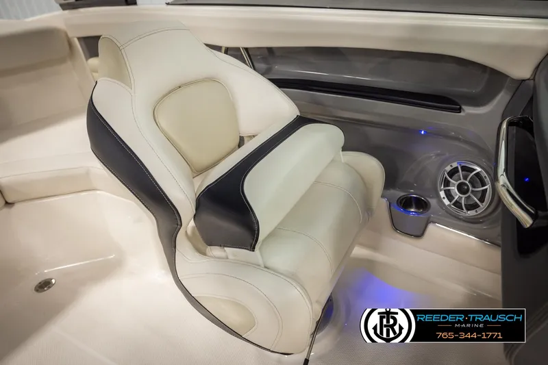 Slide: The Image of 2016 Chaparral 216 SSi boat interior with luxury seating and speaker system. - 24