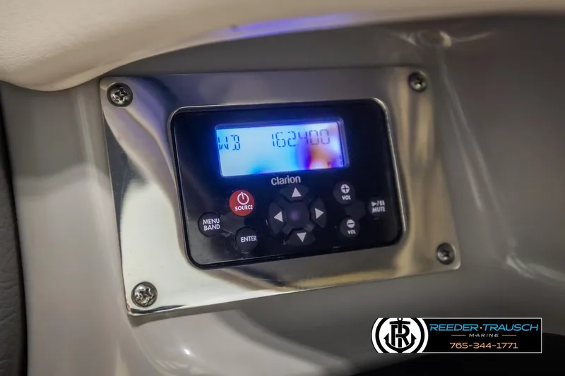 Slide: The Image of Clarion audio system in 2016 Chaparral 216 SSi boat dashboard. - 36