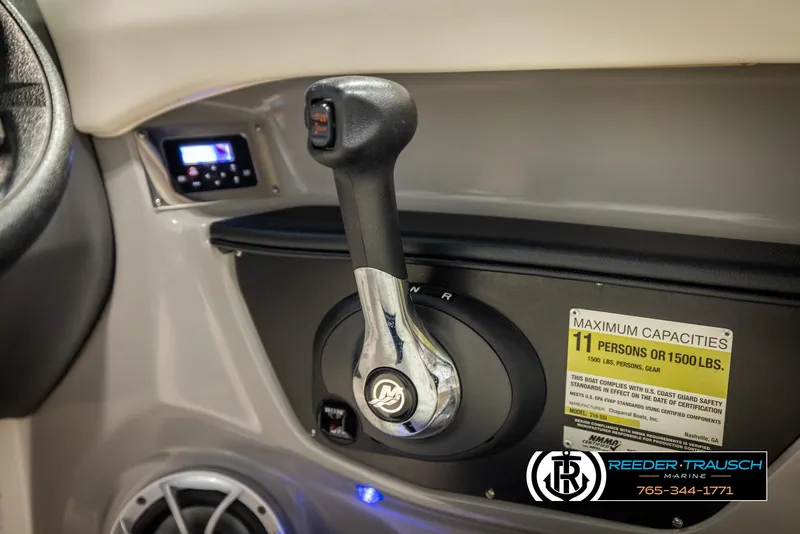 Slide: The Image of 2016 Chaparral 216 SSi boat throttle control and capacity label, 11 persons or 1500 lbs. - 37