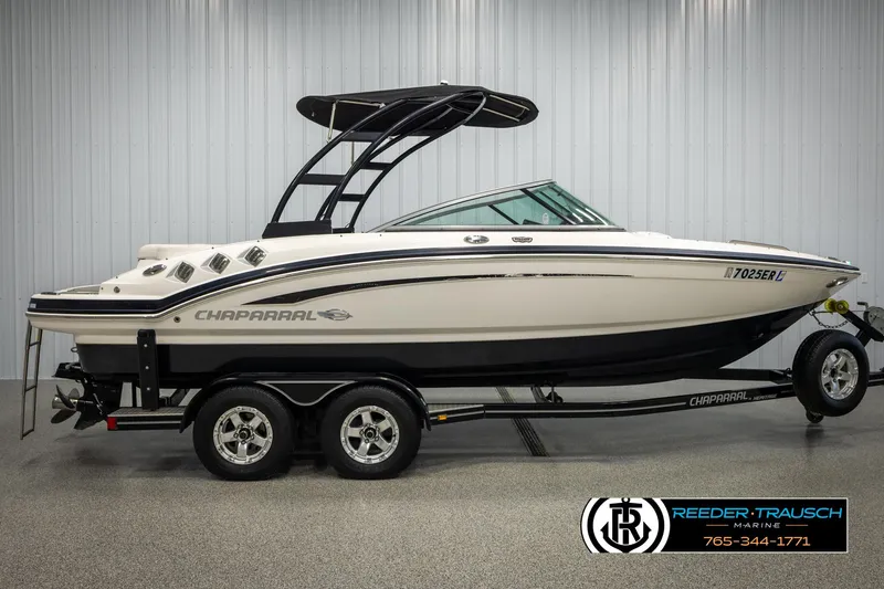Slide: The Image of 2016 Chaparral 216 SSi boat on trailer in showroom, side view. - 4