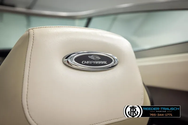 Slide: The Image of Chaparral 216 SSi 2016 boat seat with logo, Reeder-Trausch Marine branding. - 44