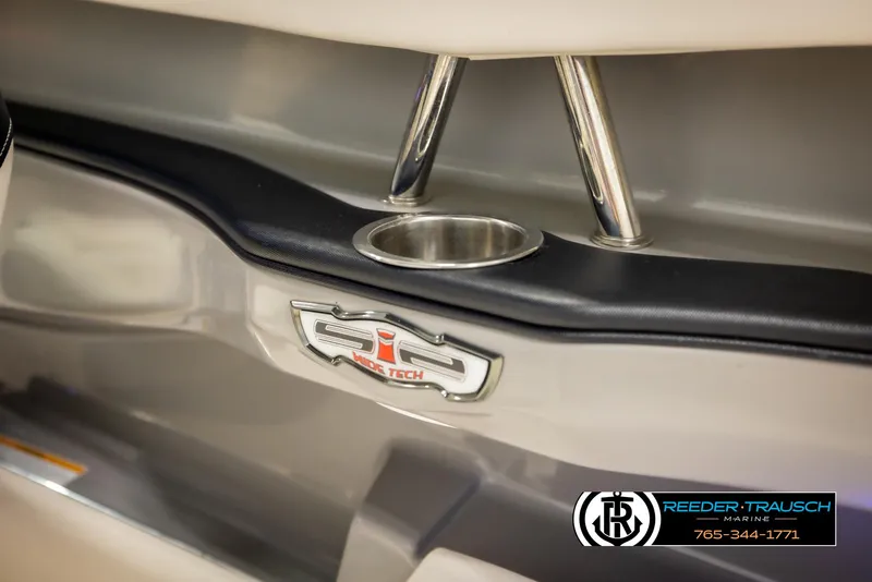 Slide: The Image of 2016 Chaparral 216 SSi boat interior with cup holder and logo detail. - 45