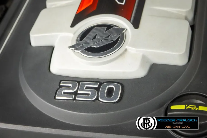 Slide: The Image of Close-up of a 2016 Chaparral 216 SSi engine with "250" marking. - 47