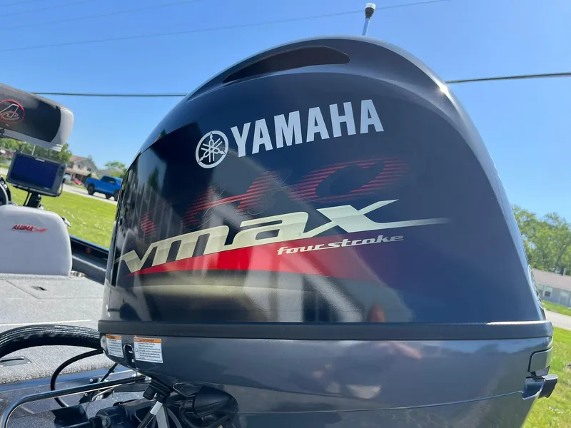 Slide: The Image of 2022 Alumacraft Pro 175 with Yamaha VMAX four-stroke engine, outdoor setting. - 20