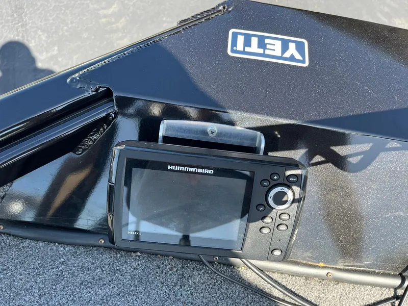 Slide: The Image of Humminbird Helix 5 fish finder on 2022 Alumacraft Pro 175 boat with Yeti sticker. - 21