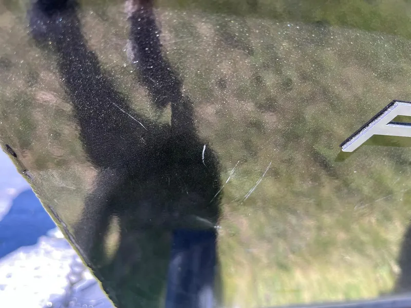 Slide: The Image of Close-up of 2022 Alumacraft Pro 175 boat surface with minor scratches. - 30