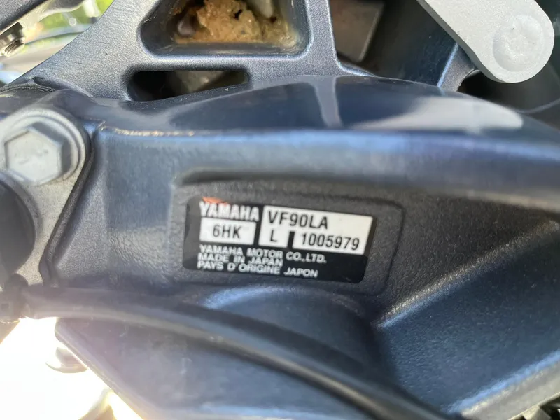 Slide: The Image of Close-up of Yamaha VF90LA engine label on 2022 Alumacraft Pro 175 boat. - 31