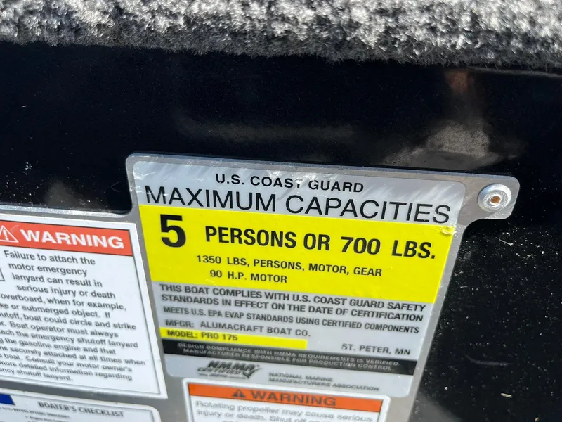 Slide: The Image of 2022 Alumacraft Pro 175 capacity label, 5 persons or 700 lbs, U.S. Coast Guard compliant. - 33