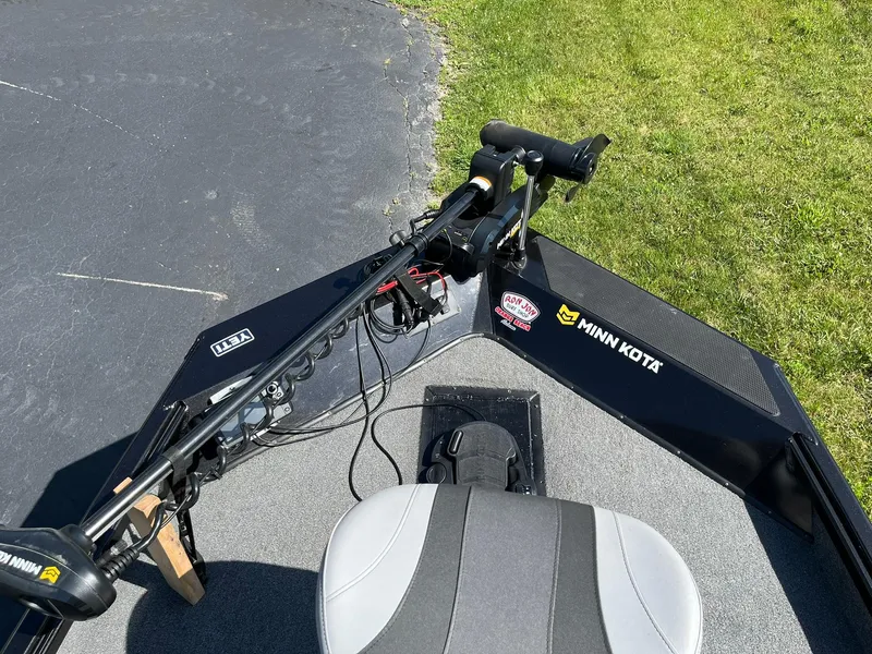 Slide: The Image of 2022 Alumacraft Pro 175 boat with Minn Kota trolling motor on a sunny day. - 7