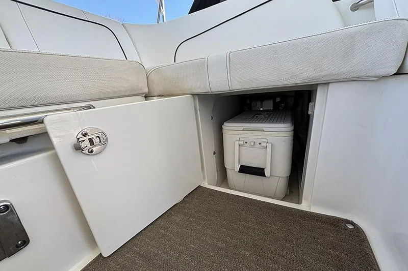 Slide: The Image of Interior storage compartment of a 2014 Sea Ray 240 Sundeck boat. - 31