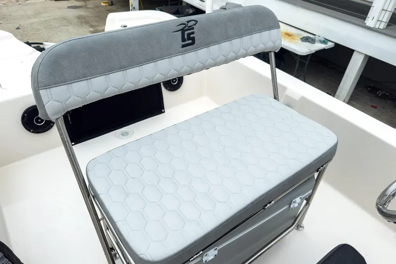 Slide: The Image of 2026 Carolina Skiff E20 JVX CC boat seat with hexagonal pattern upholstery. - 11