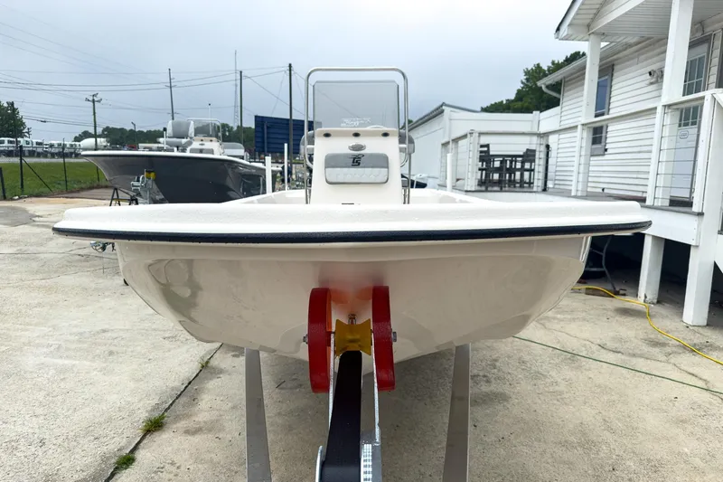 Slide: The Image of 2026 Carolina Skiff E20 JVX CC boat on trailer, outdoor display. - 27