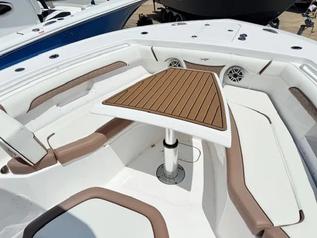 Slide: The Image of 2025 Tidewater 272 CC Adventure boat with dual Yamaha engines and spacious deck layout. - 7