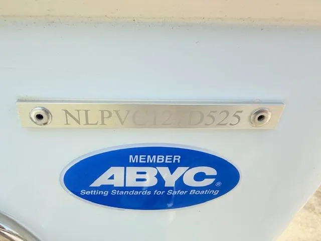 Slide: The Image of 2025 Tidewater 272 CC Adventure boat seating with dual cushioned chairs. - 9