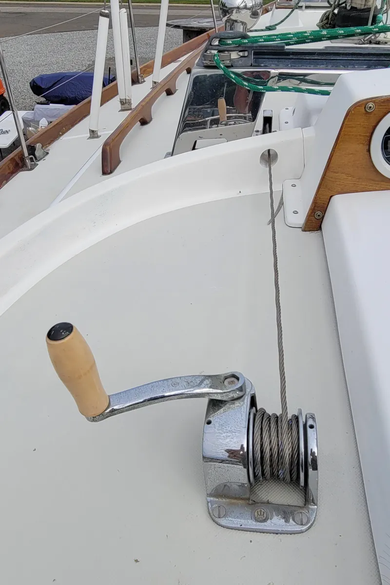 Slide: The Image of Sailboat deck with ropes and winches, Bristol 38.8, 1985 model, docked at marina. - 11