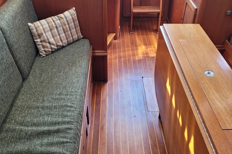 Slide: The Image of Interior of 1985 Bristol 38.8 sailboat with wooden cabinetry and drawers. - 42