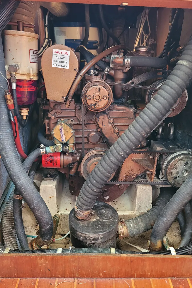 Slide: The Image of 1985 Bristol 38.8 engine compartment with Universal Atomic Diesel engine components. - 48