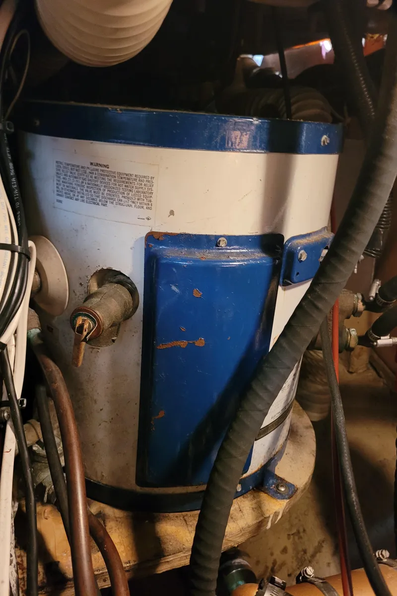 Slide: The Image of Close-up of Universal Atomic Diesel engine label, model 5444, serial 440509, on a 1985 Bristol 38.8. - 49