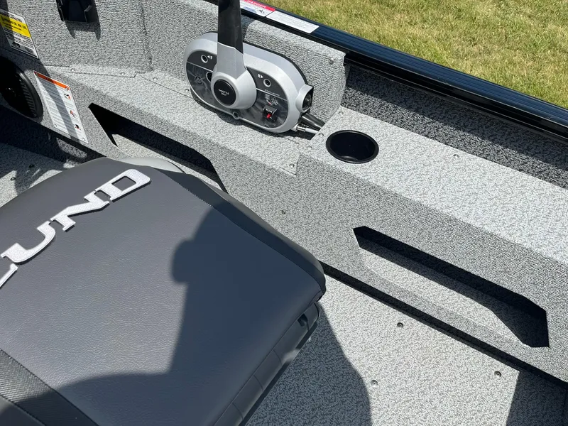 Slide: The Image of Interior of 2026 Lund 1675 Adventure SS boat with steering controls and seat. - 22